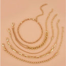 A Silver five - piece set Chic Multi - Layered Alloy Bracelet Set - Fashionable Stackable Jewelry - RnR Galore