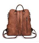Black Chic Women's PU Leather Convertible Backpack - Anti - Theft Design, Multi - Pocket Shoulder Bag with Tassel - RnR Galore